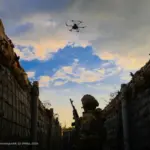 Безпілотник як акустичний датчик на висотній будівлі у сірій зоні, контроль логістичних маршрутів